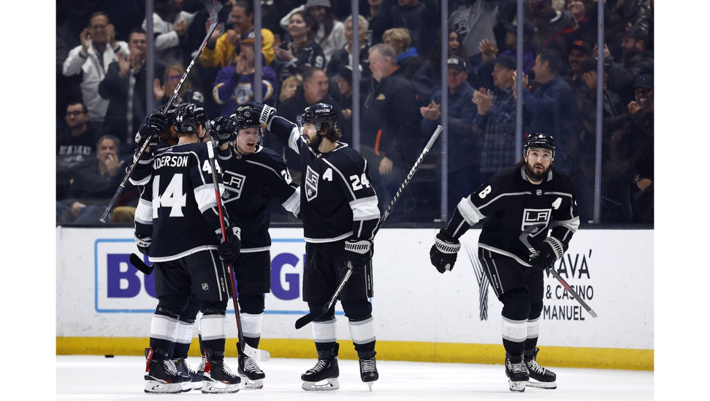 Kings hold off Sharks, keep surging up standings