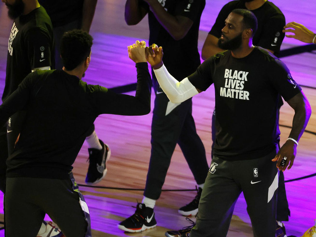 LeBron James wears a fake MAGA hat with a social justice message about Breonna Taylor