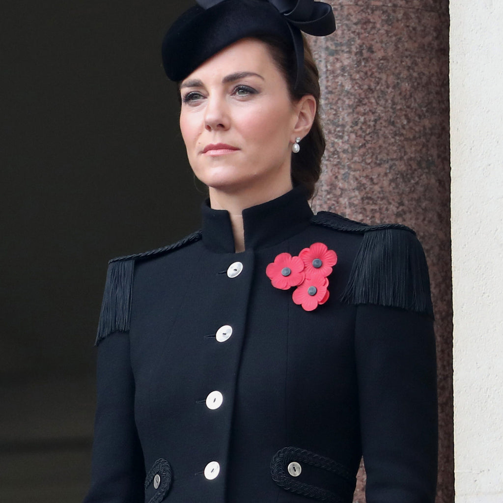 Though on opposite sides of the Atlantic Ocean right now, sisters-in-law Kate Middleton and Meghan Markle both opted for a similar aesthetic to mark Remembrance Sunday over the weekend.