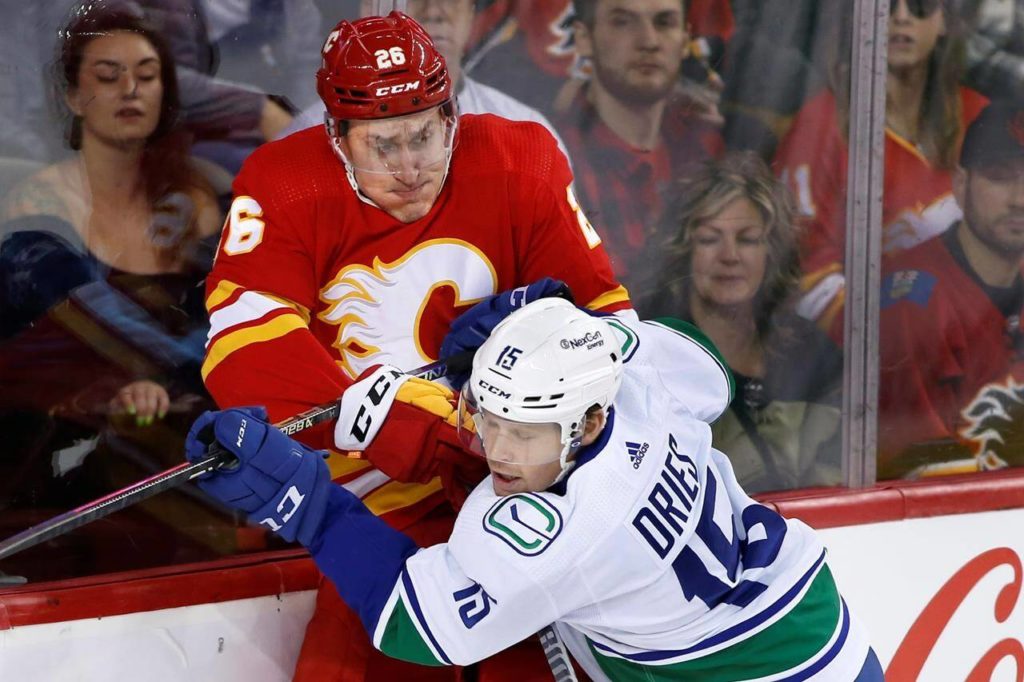 Weegar gives Calgary Flames big lift in 3-2 win over Canucks