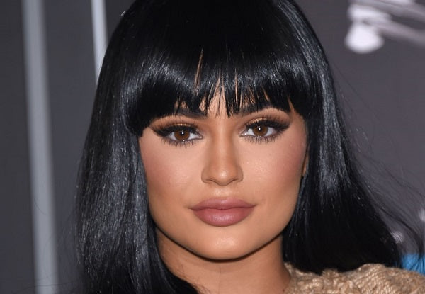 Kylie Jenner Exudes 60s Glamor Wearing Nothing But Hat & Veil In Tasteful Shoot